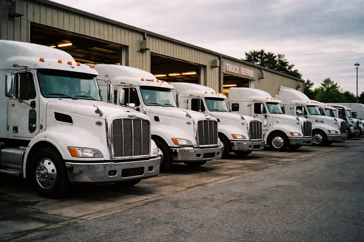 fleet vehicles lined up for service at Coppertop Truck Repair in Alberta